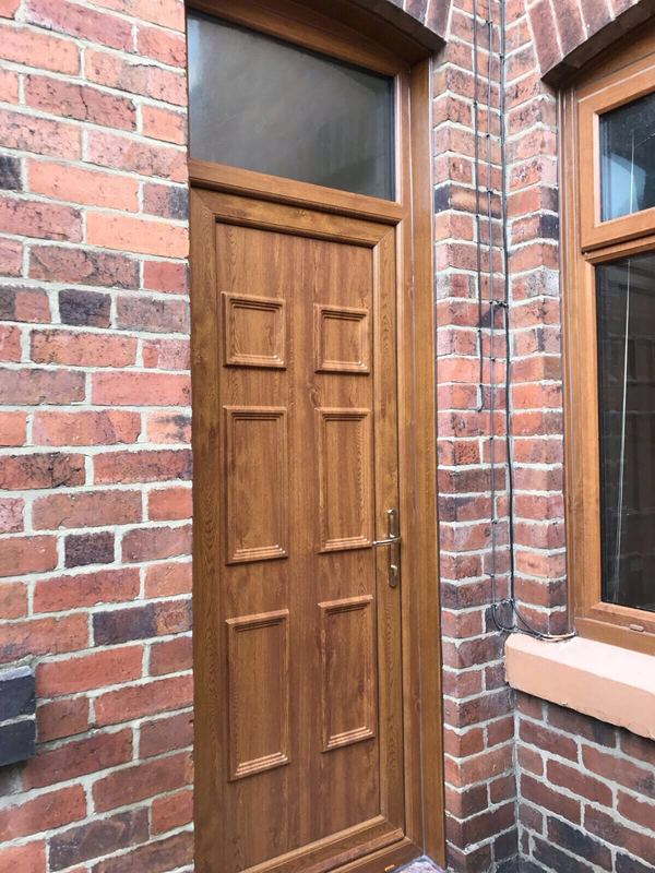 Wooden Door Installation in Stoke on Trent with Golden Oak Finish